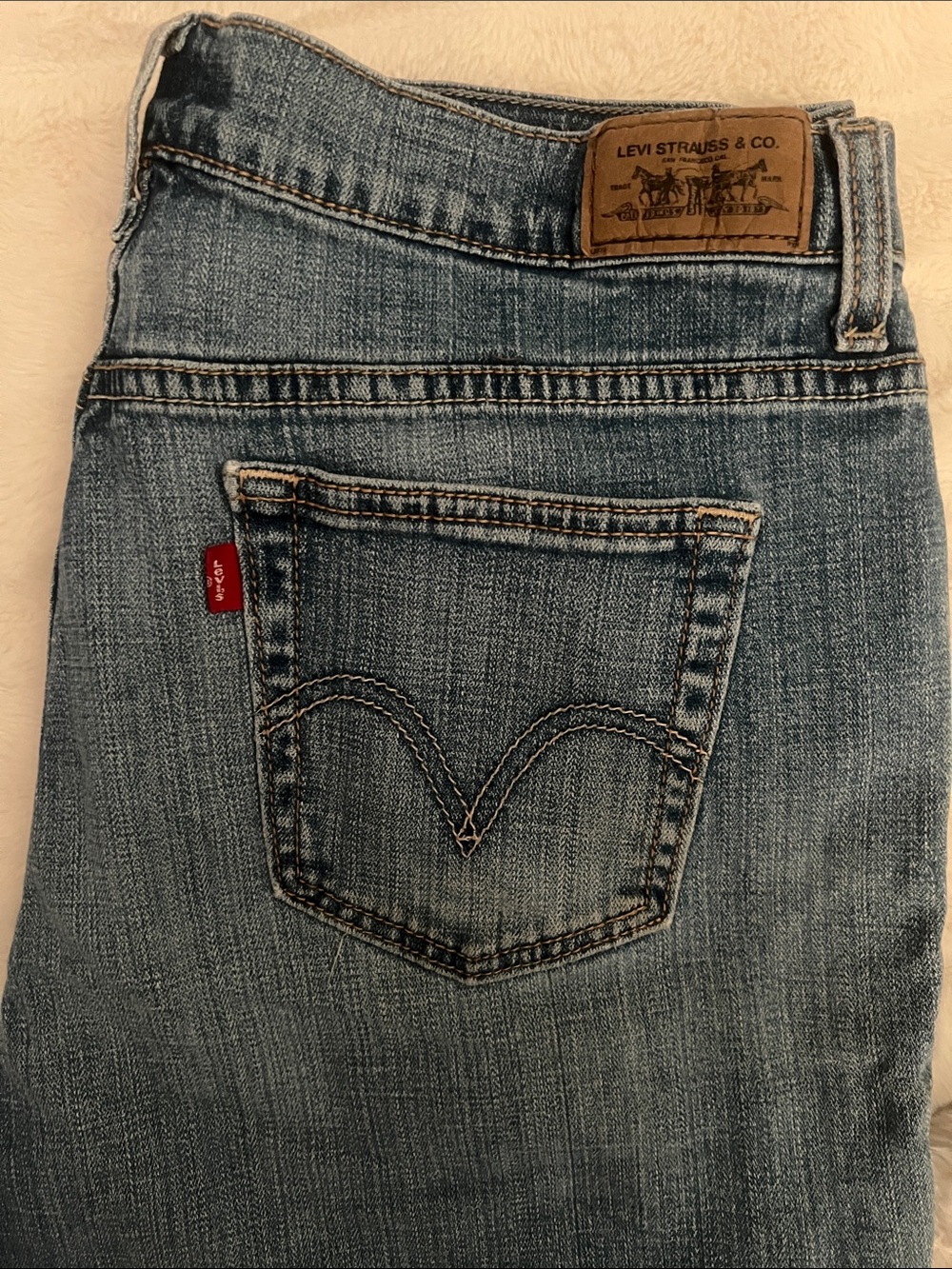 Levi's Straight Leg Light Blue Denim Jeans with Red Tab